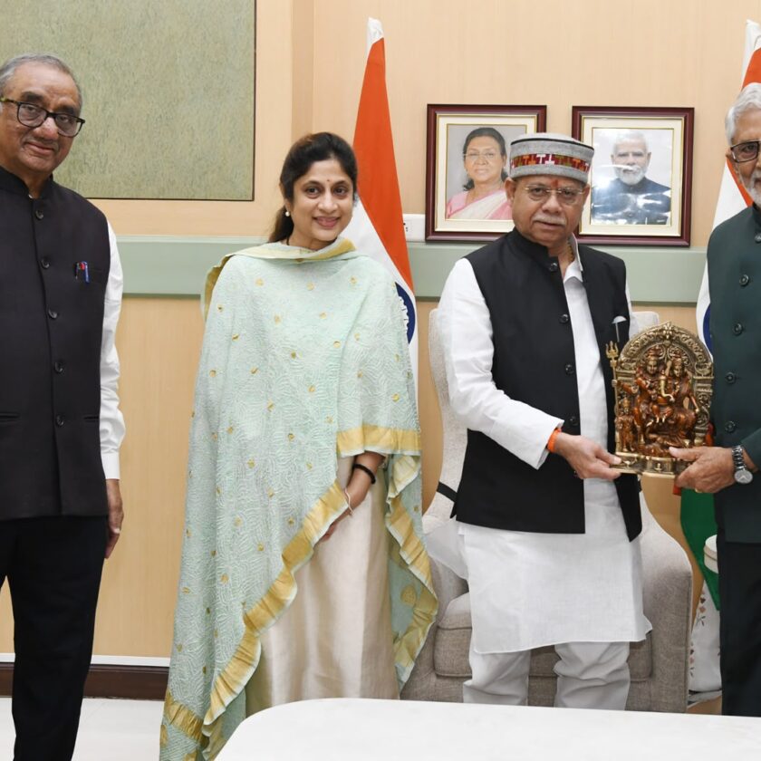 Telangana Governor Shiv Pratap Shukla felicitates Murali Mohan.