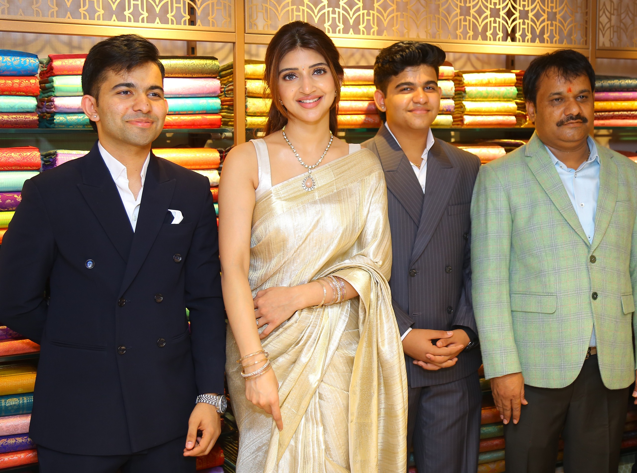 English tollywood star srilila chethula meeduga 'di signature silx' showroom prarambham 'The Signature Silks' showroom inaugurated by Tollywood star Sreeleela.